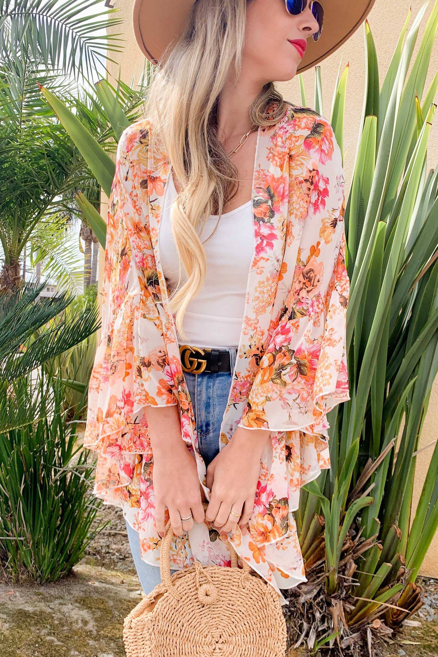 zoomed out styled view of Floral print ruffled sleeve chiffon kimono cardigan with limited stock