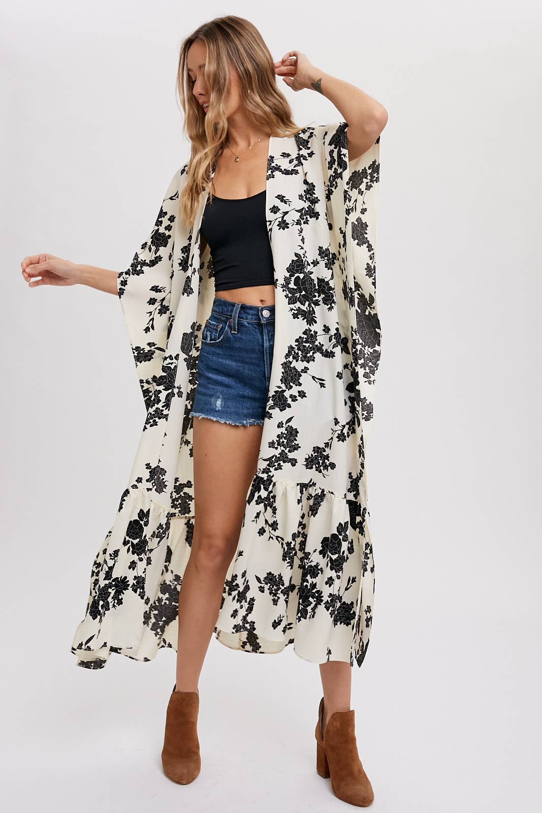 styled view of Ivory floral print maxi kimono with open front and ruffled tiered hem