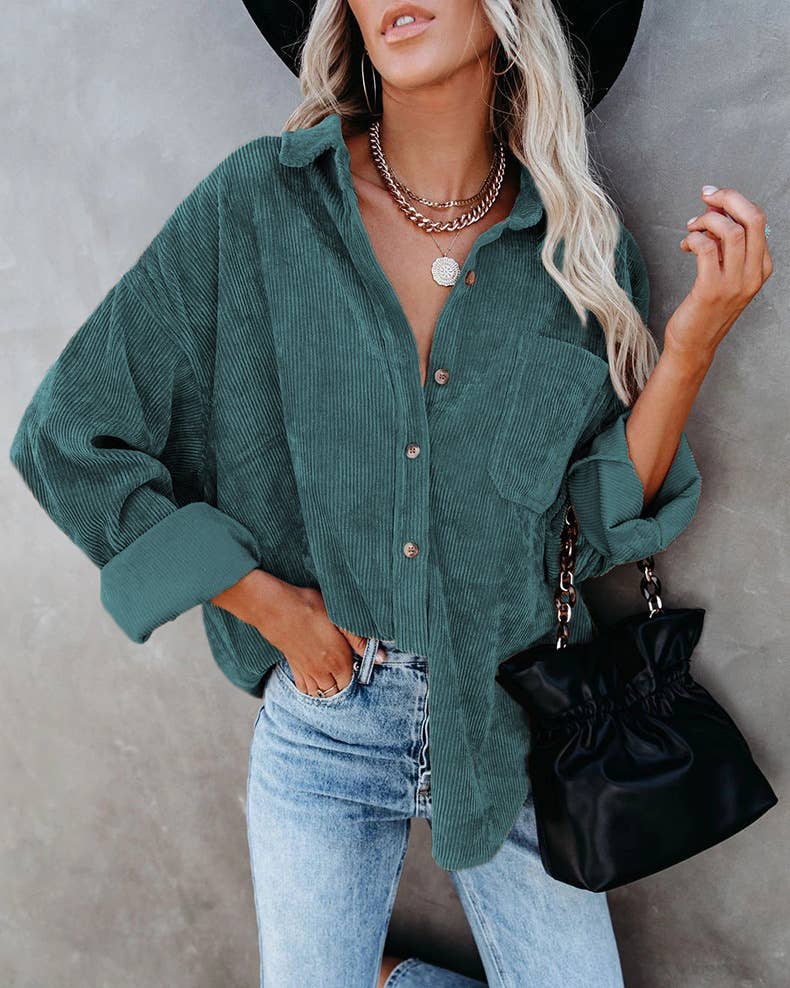 Forest green corduroy oversized shacket with a solid design, providing a trendy and comfortable oversized fit.