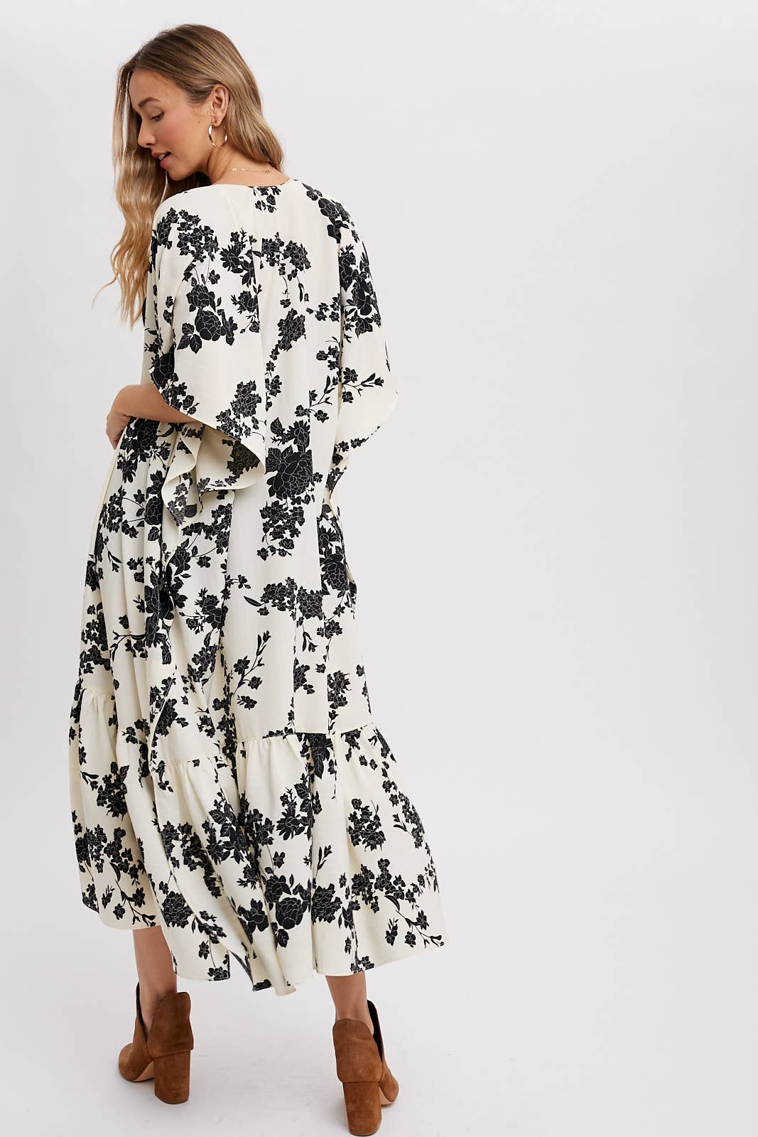back view of Ivory floral print maxi kimono with open front and ruffled tiered hem