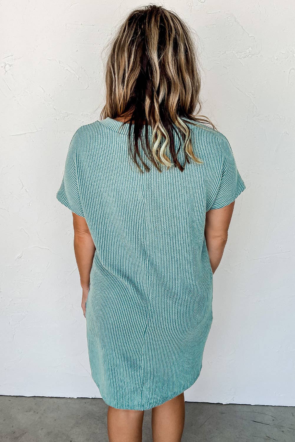 back view of Striped ribbed knit T-shirt shift dress with patch pocket