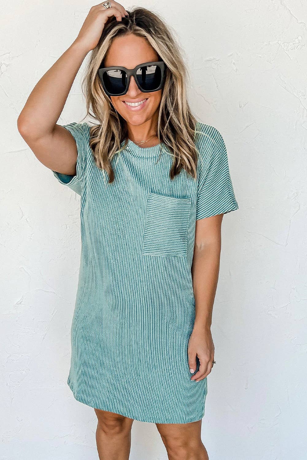 another styled view of Striped ribbed knit T-shirt shift dress with patch pocket