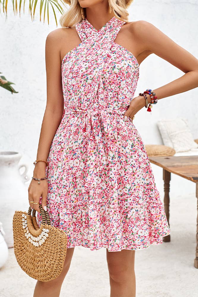 styled view of Pink halter neck wrapped sleeveless floral dress