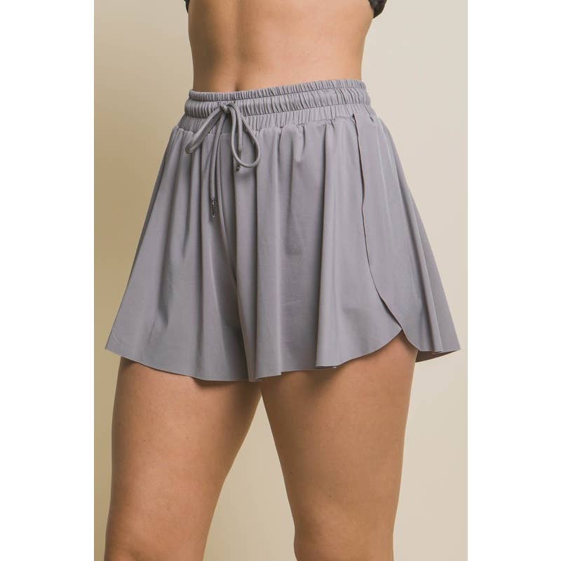 view of gray Activewear Two In One Drawstring Shorts made from 84% nylon and 16% spandex, featuring a stylish design and adjustable drawstring for a comfortable fit.