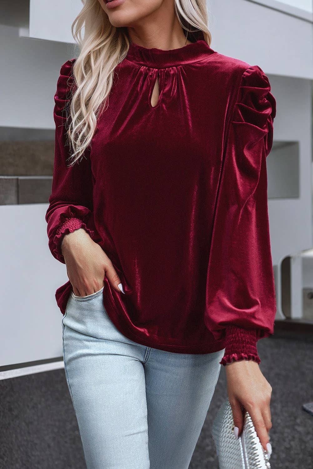 untucked styled view of Red Neck Puff Sleeve Velvet Blouse with Long Sleeves and Knot Detail