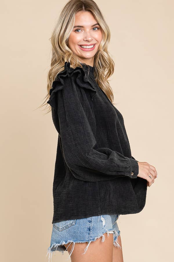 side view of Black Mineral Wash Ruffled Sleeve Top with Long Sleeves and Romantic Ruffle Detail