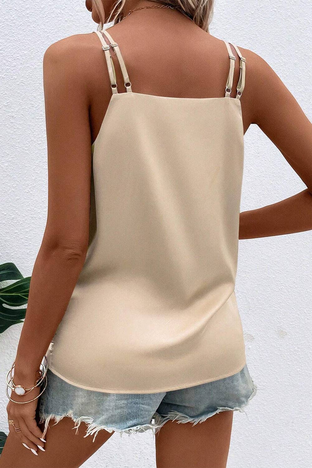 back view of Apricot wrap V-neck ruche satin cami top with adjustable straps, featuring a pleated and ruched design for a sexy and elegant appearance.