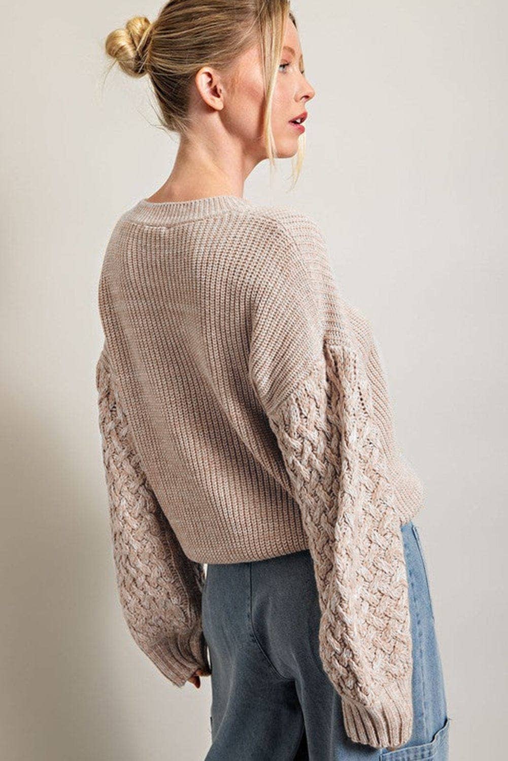 back view of Madelynne Chunky Knit Sweater in Parchment, featuring a drop shoulder design and chunky knit texture.