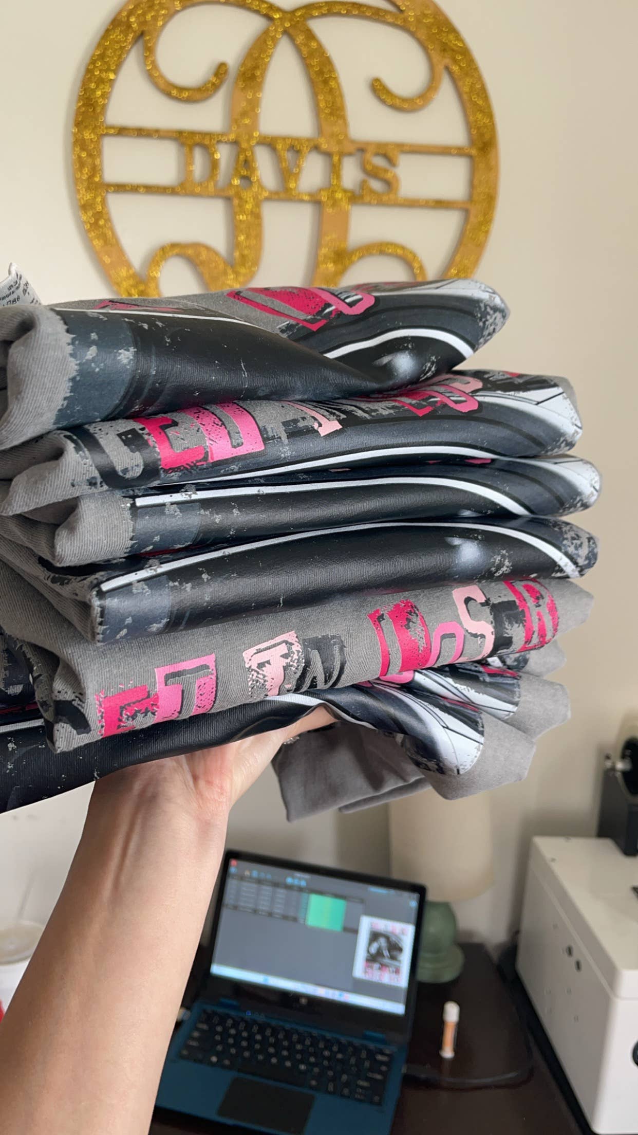 stack of Ivory 'Get in Loser We’re Saving America' Trump Tee Shirt
