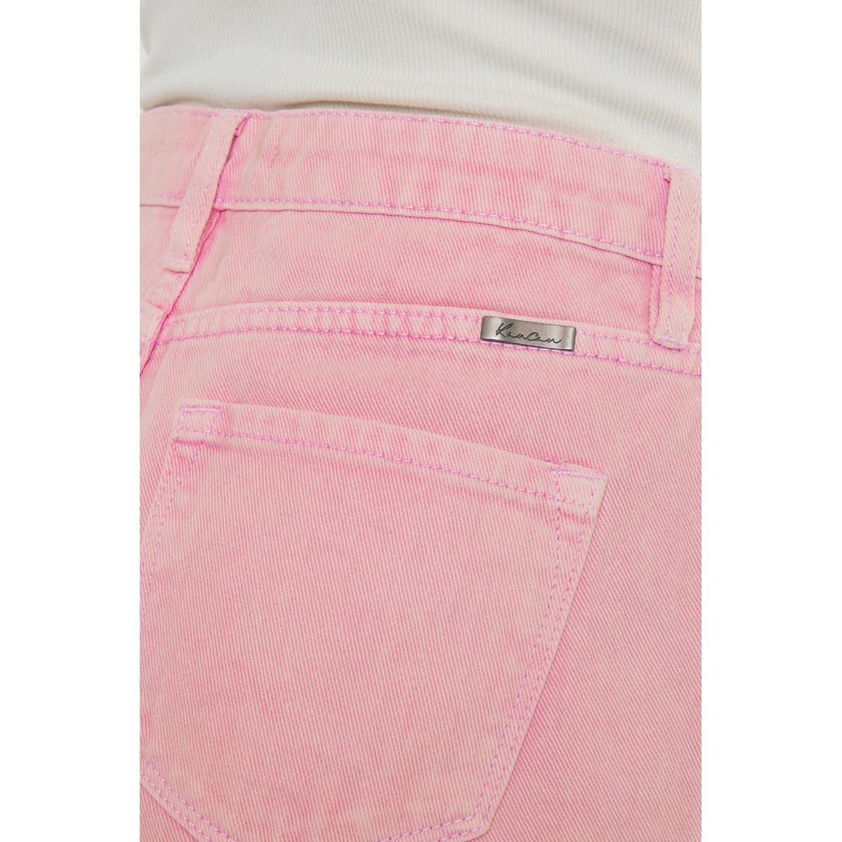 pocket view of Kan Can USA pink high rise denim shorts with frayed hem