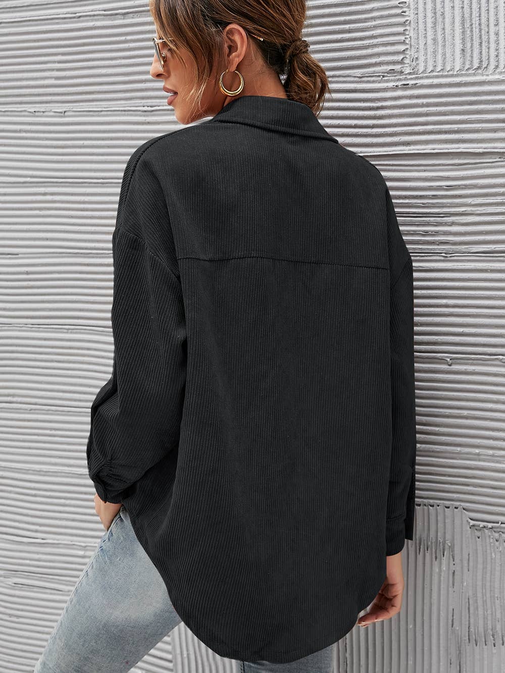 back view of Forest green corduroy oversized shacket with a solid design, providing a trendy and comfortable oversized fit.
