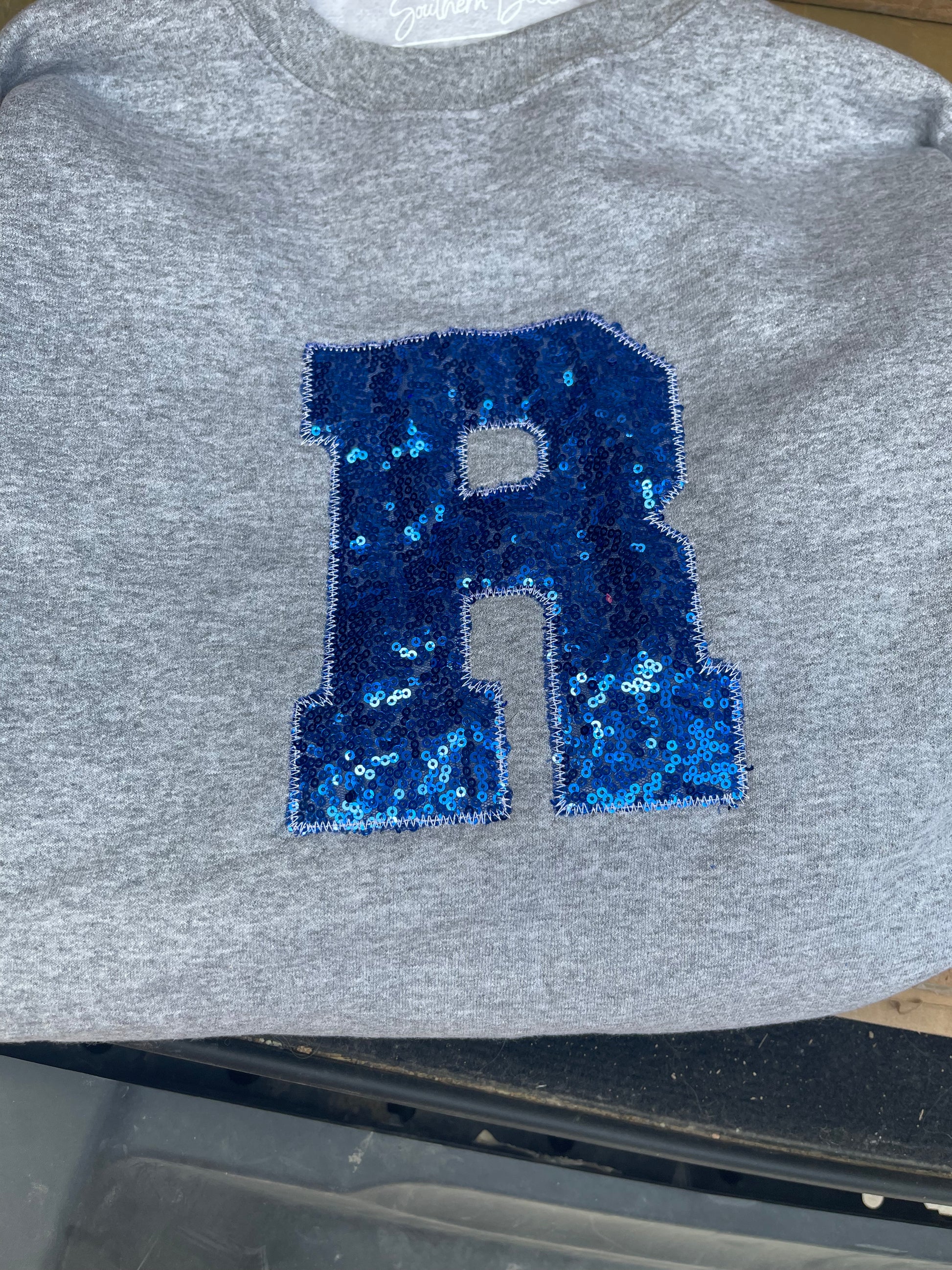 Custom school sweatshirt with varsity font letters, unisex soft crew neck tee