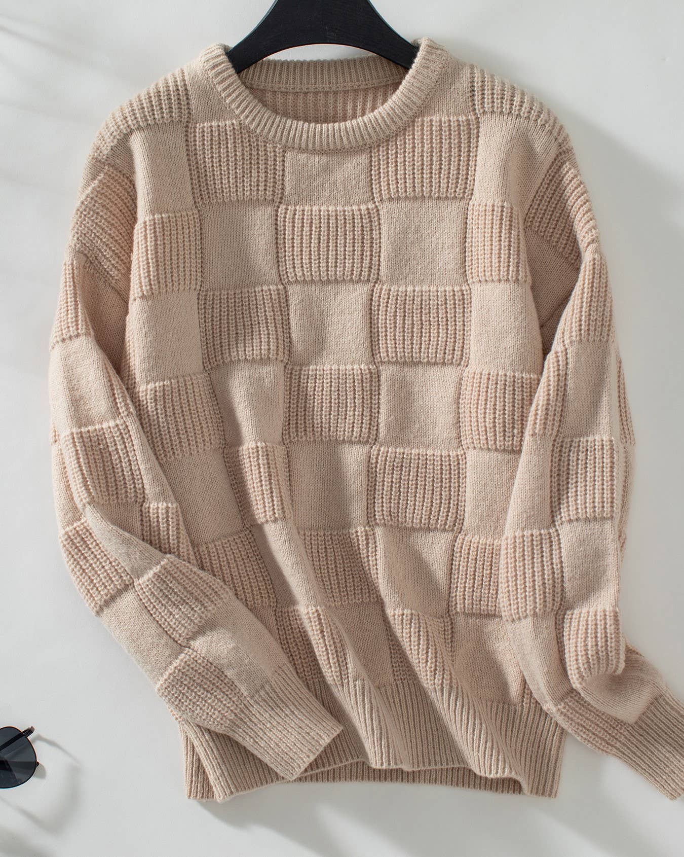 Apricot minimalist checked crewneck sweater featuring a subtle checked pattern and a comfortable, stylish fit.