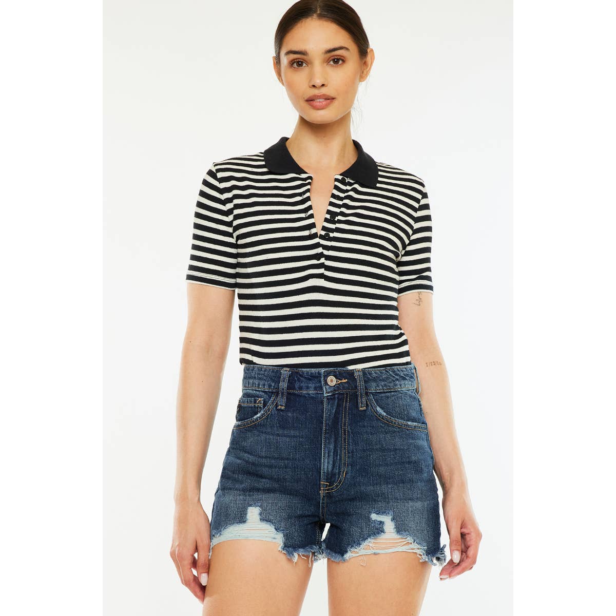 styled front view of Kan Can USA high rise mom shorts with dark stone wash and raw frayed hem