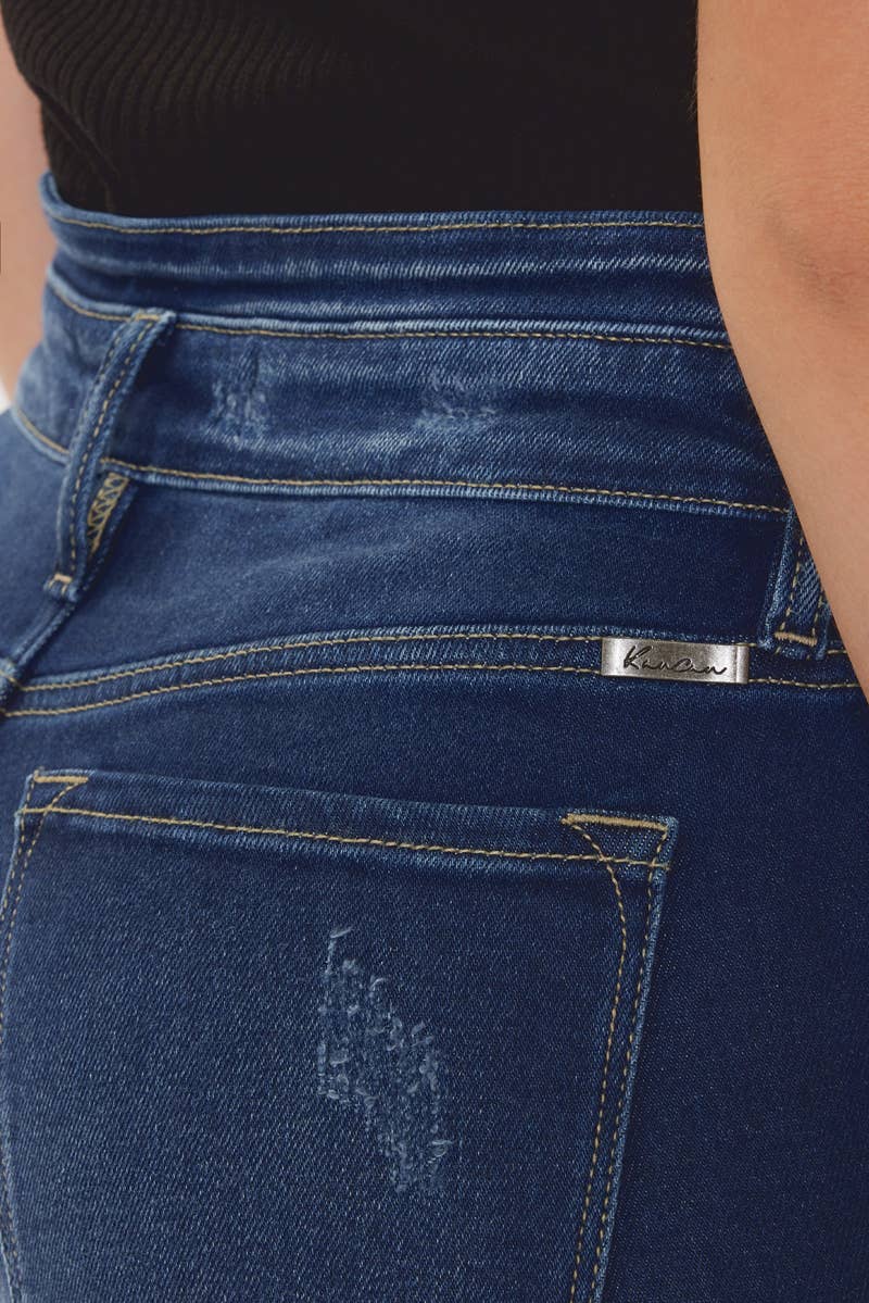 pocket detail of Kan Can High Rise WB Detail Curvy Flare Jeans in Dark Stone Wash with comfort stretch fabric, button fly, and non-distressed open pack flare design. Features an 11" rise and 33" inseam, made from 95% cotton, 4% polyester, and 1% Lycra.