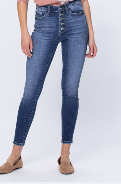 Judy Blue Hi-Rise Button Fly Skinny Jeans with a 10.5" front rise and 28.5" inseam, made from 93% cotton, 6% polyester, and 1% spandex. Model is 5'10", wearing size 1.