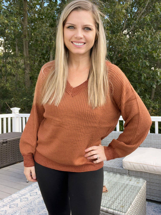 Balloon sleeve basic knit slouchy sweater made from 100% acrylic, offering an oversized, relaxed fit.
