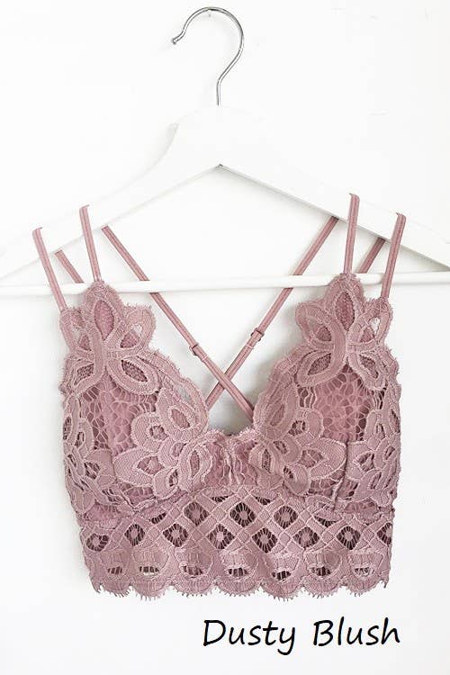 Vanilla Monkey Plus Size Scalloped Lace Cami Bralette with scalloped lace detail, criss-cross straps at the back, and adjustable bra straps. Made of 60% nylon and 40% cotton, featuring removable bra pads.